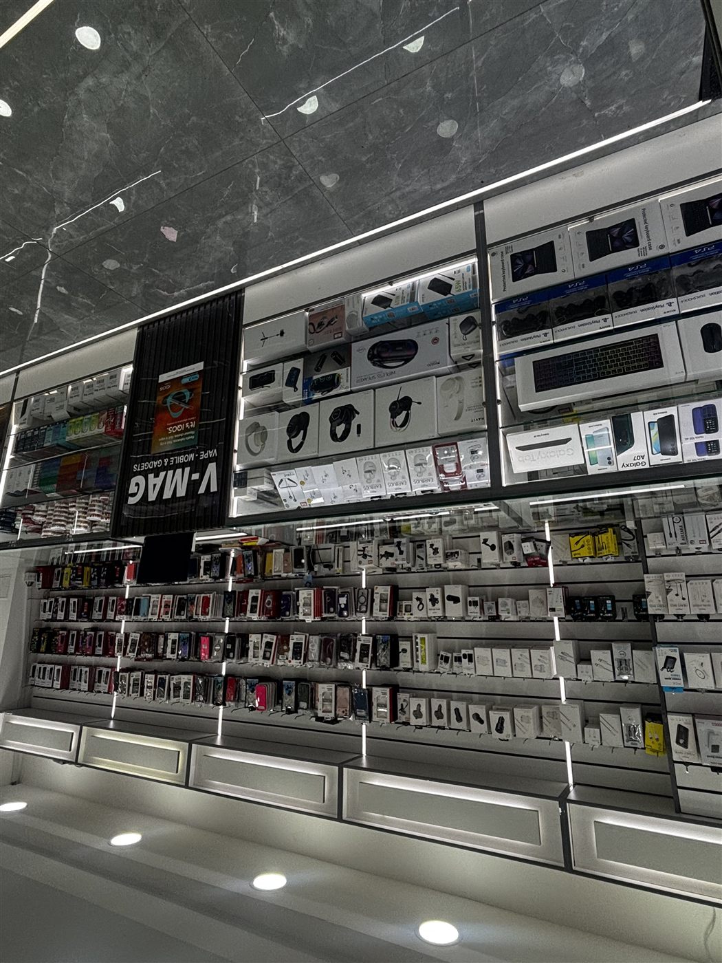 Mobex shop interior — accessories and cases stocked